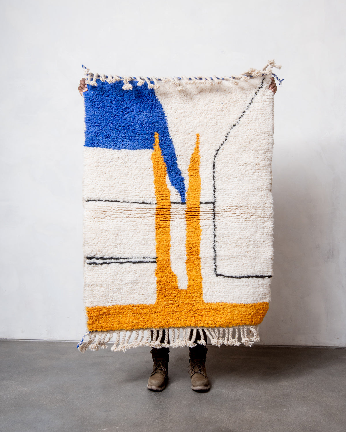 Modern, designer, handcrafted Berber rug from Morocco. Beniourain carpet with beautiful colours and patterns and fluffy wool texture.